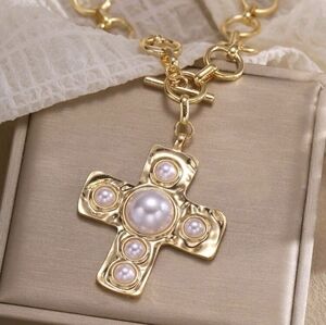 Gold Cross Pendant Necklace with Pink Pearl Accents